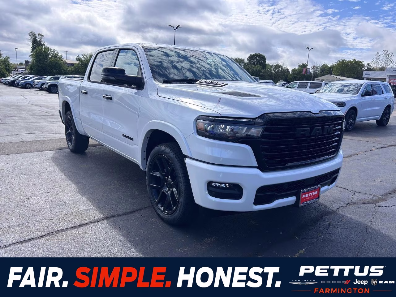 2026 Ivory White Tri-Coat Pearlcoat Ram 1500 Laramie 4X4 Truck