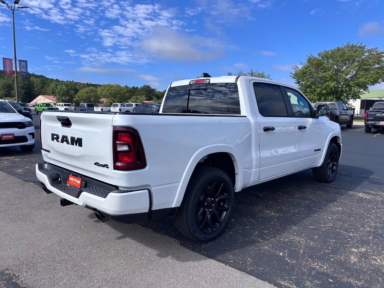 2026 Ivory White Tri-Coat Pearlcoat Ram 1500 Laramie 4X4 Truck