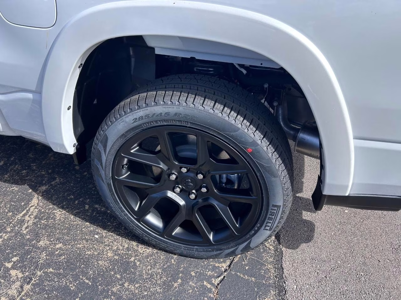 2026 Ivory White Tri-Coat Pearlcoat Ram 1500 Laramie 4X4 Truck