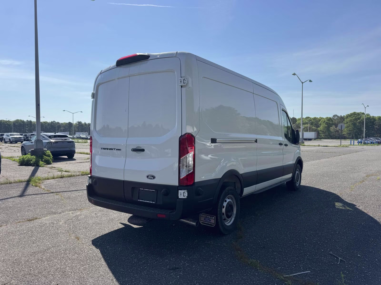 2026 Oxford White Ford Transit Cargo Van T-250 148 Med Rf 9150 GVWR RWD RWD Van