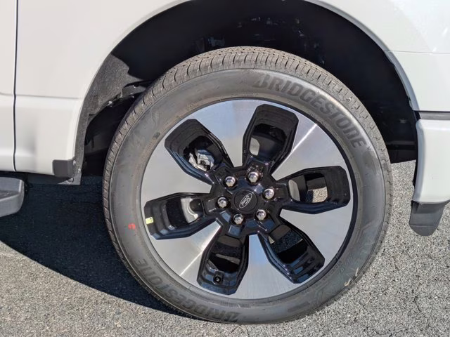 2025 White Metallic Ford F-150 Lightning Platinum AWD Truck