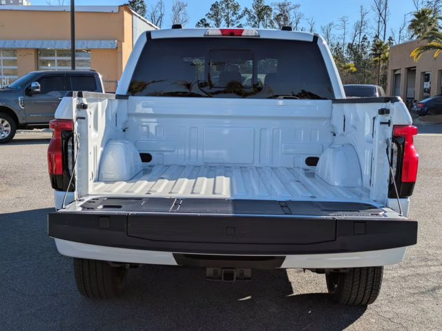 2025 White Metallic Ford F-150 Lightning Platinum AWD Truck