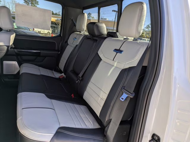 2025 White Metallic Ford F-150 Lightning Platinum AWD Truck