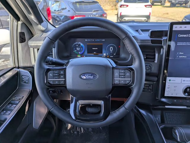 2025 White Metallic Ford F-150 Lightning Platinum AWD Truck