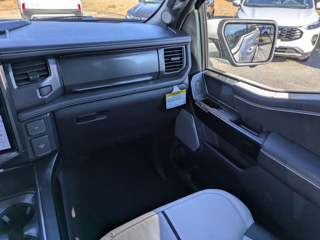 2025 White Metallic Ford F-150 Lightning Platinum AWD Truck