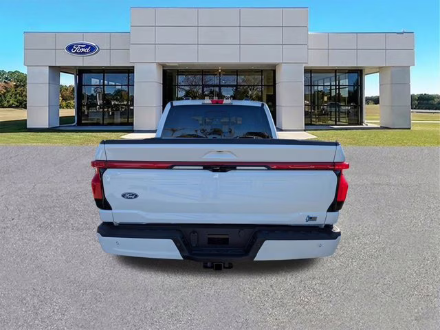 2025 White Metallic Ford F-150 Lightning Platinum AWD Truck