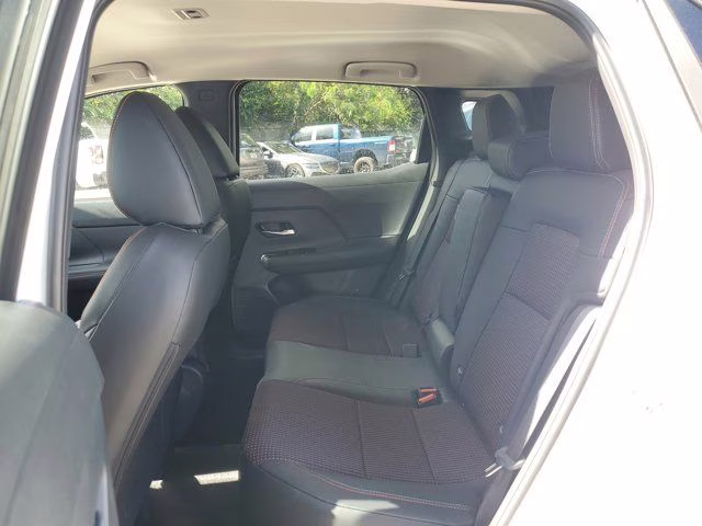 2026 Aspen White/Super Black Nissan Kicks SR FWD SUV