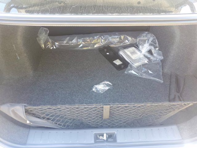 2025 Brilliant Silver Metallic Nissan Versa 1.6 SR FWD Sedan