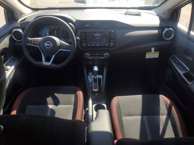 2025 Brilliant Silver Metallic Nissan Versa 1.6 SR FWD Sedan