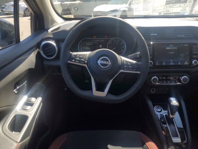 2025 Brilliant Silver Metallic Nissan Versa 1.6 SR FWD Sedan