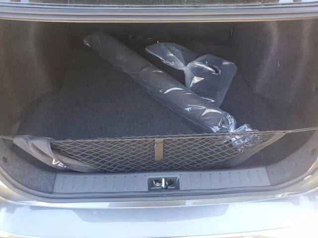 2025 Gun Metallic Nissan Versa 1.6 SR FWD Sedan