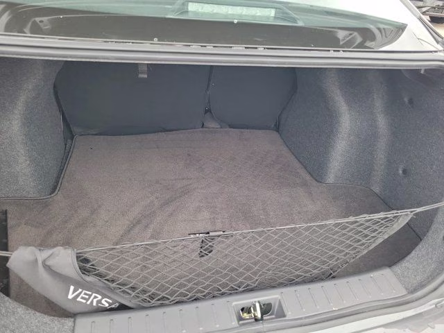 2025 Gun Metallic Nissan Versa 1.6 SV FWD Sedan