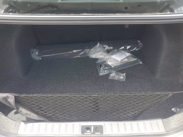 2025 Gray Sky Pearl Nissan Versa 1.6 SR FWD Sedan