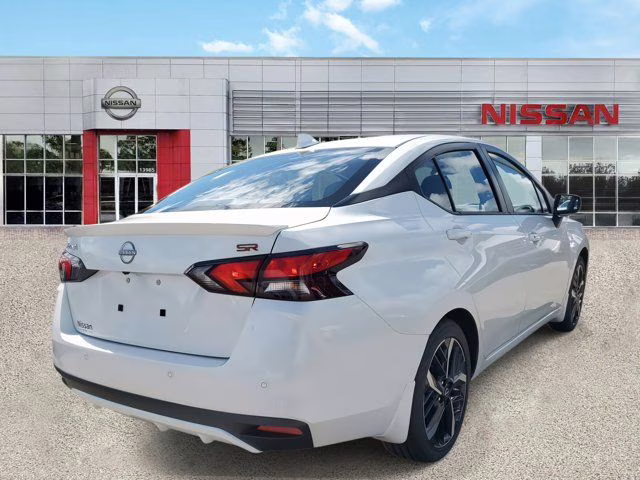 2025 Aspen White Tricoat Nissan Versa 1.6 SR FWD Sedan