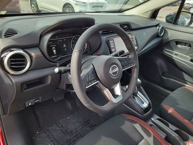 2025 Aspen White Tricoat Nissan Versa 1.6 SR FWD Sedan