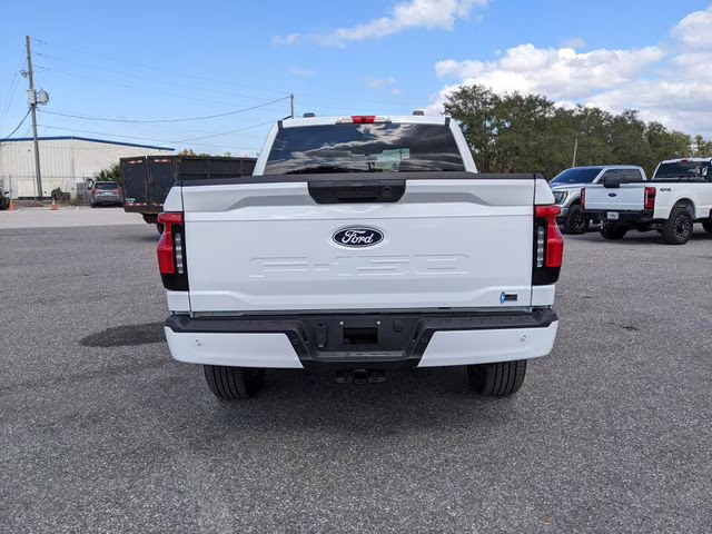 2025 Oxford White Ford F-150 Lightning Flash AWD Truck