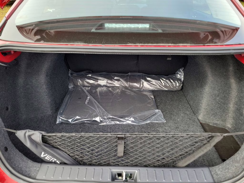 2025 Scarlet Nissan Versa 1.6 SV FWD Sedan