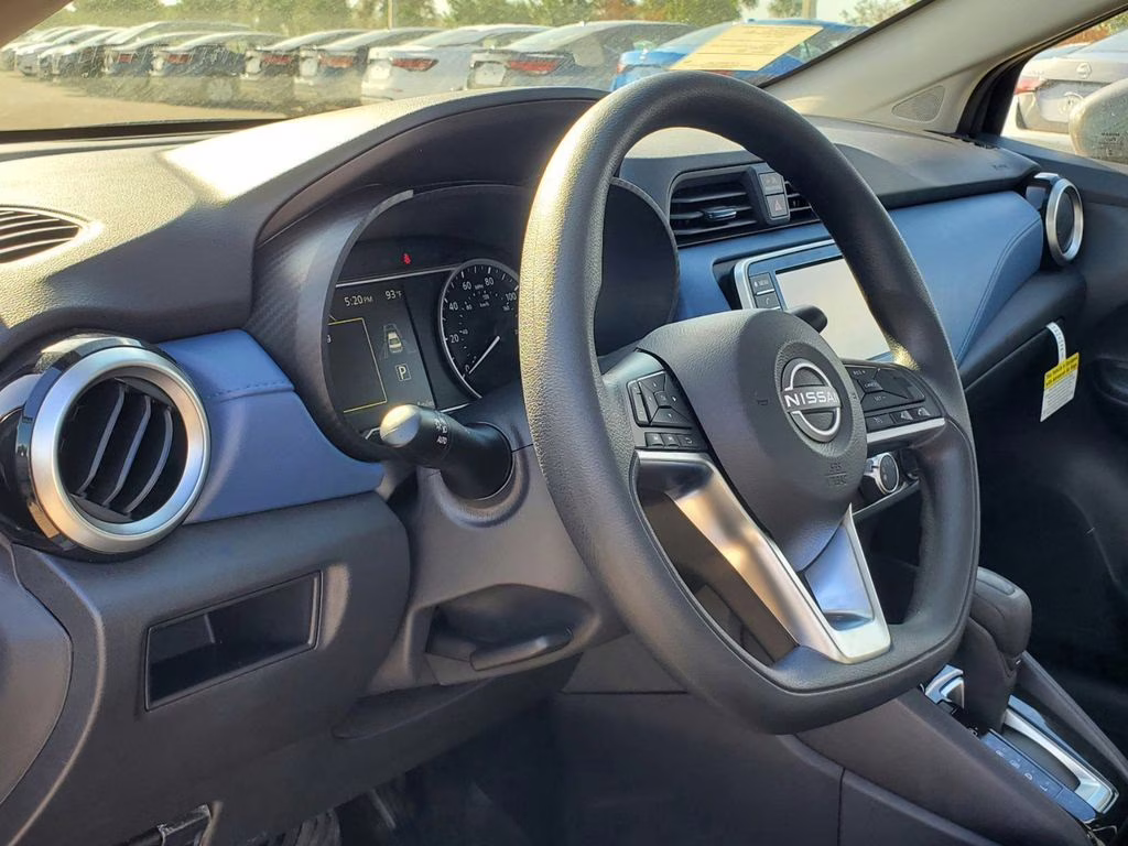 2025 Scarlet Nissan Versa 1.6 SV FWD Sedan