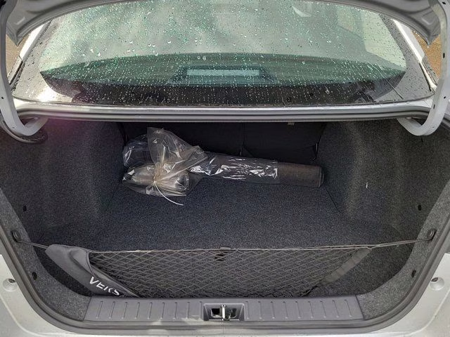 2025 Brilliant Silver Metallic Nissan Versa 1.6 SV FWD Sedan