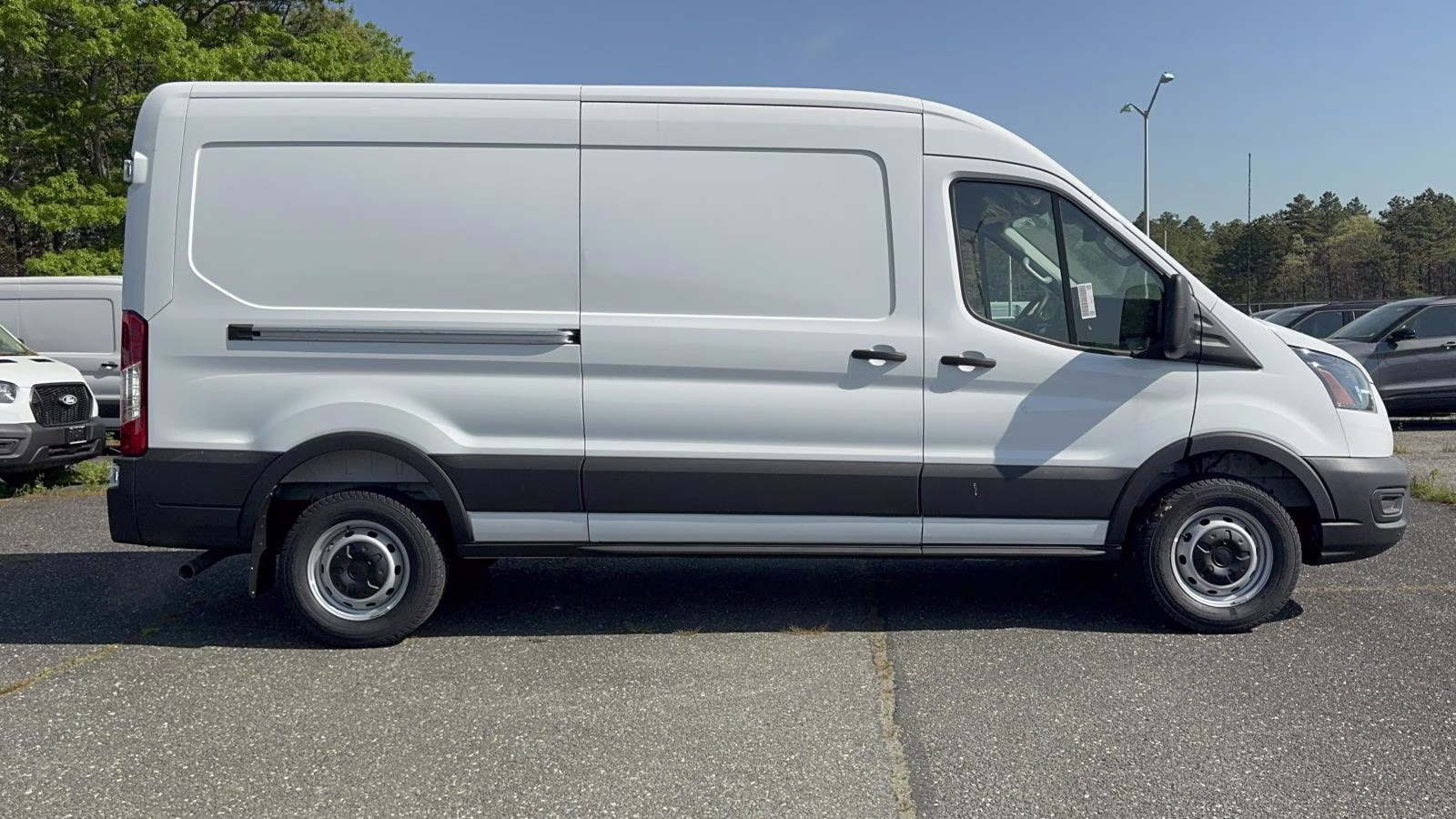 2026 Oxford White Ford Transit Cargo Van T-250 148 Med Rf 9150 GVWR RWD RWD Van