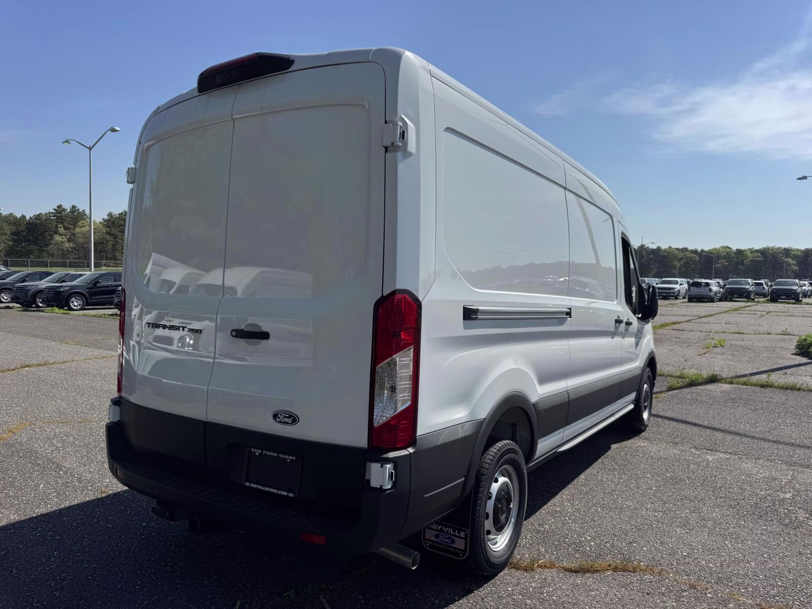 2026 Oxford White Ford Transit Cargo Van T-250 148 Med Rf 9150 GVWR RWD RWD Van
