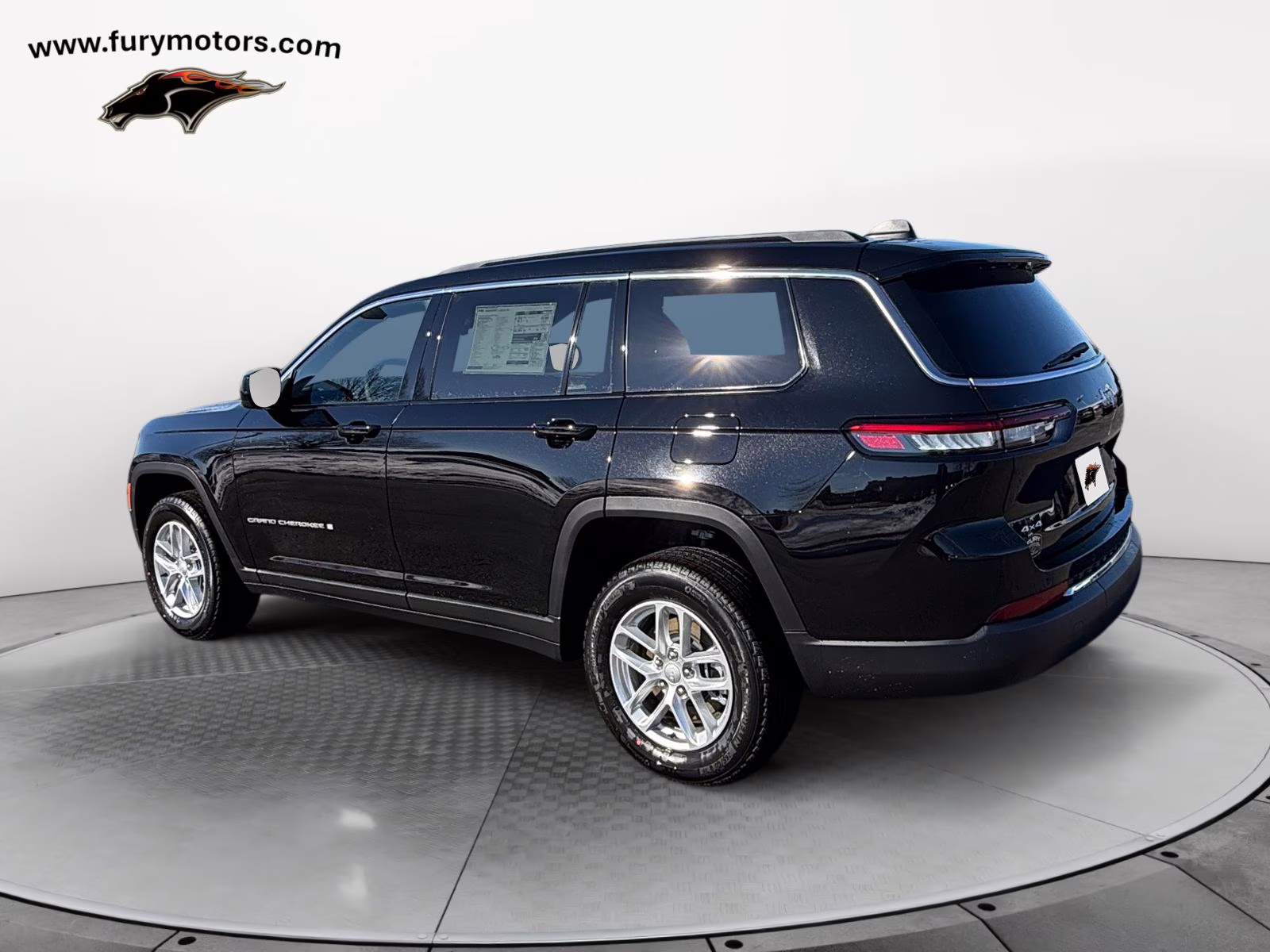 2025 Diamond Black Crystal Pearlcoat Jeep Grand Cherokee L Laredo 4X4 SUV