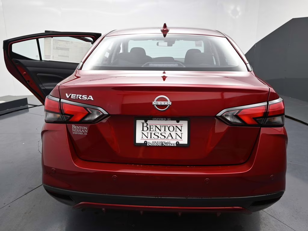 2025 Scarlet Ember Tintcoat Nissan Versa 1.6 SV FWD Sedan