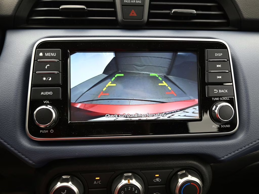 2025 Scarlet Ember Tintcoat Nissan Versa 1.6 SV FWD Sedan