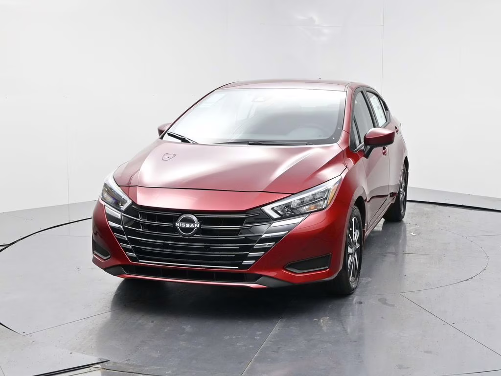 2025 Scarlet Ember Tintcoat Nissan Versa 1.6 SV FWD Sedan