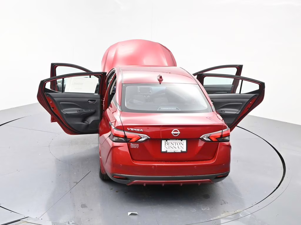 2025 Scarlet Ember Tintcoat Nissan Versa 1.6 SV FWD Sedan