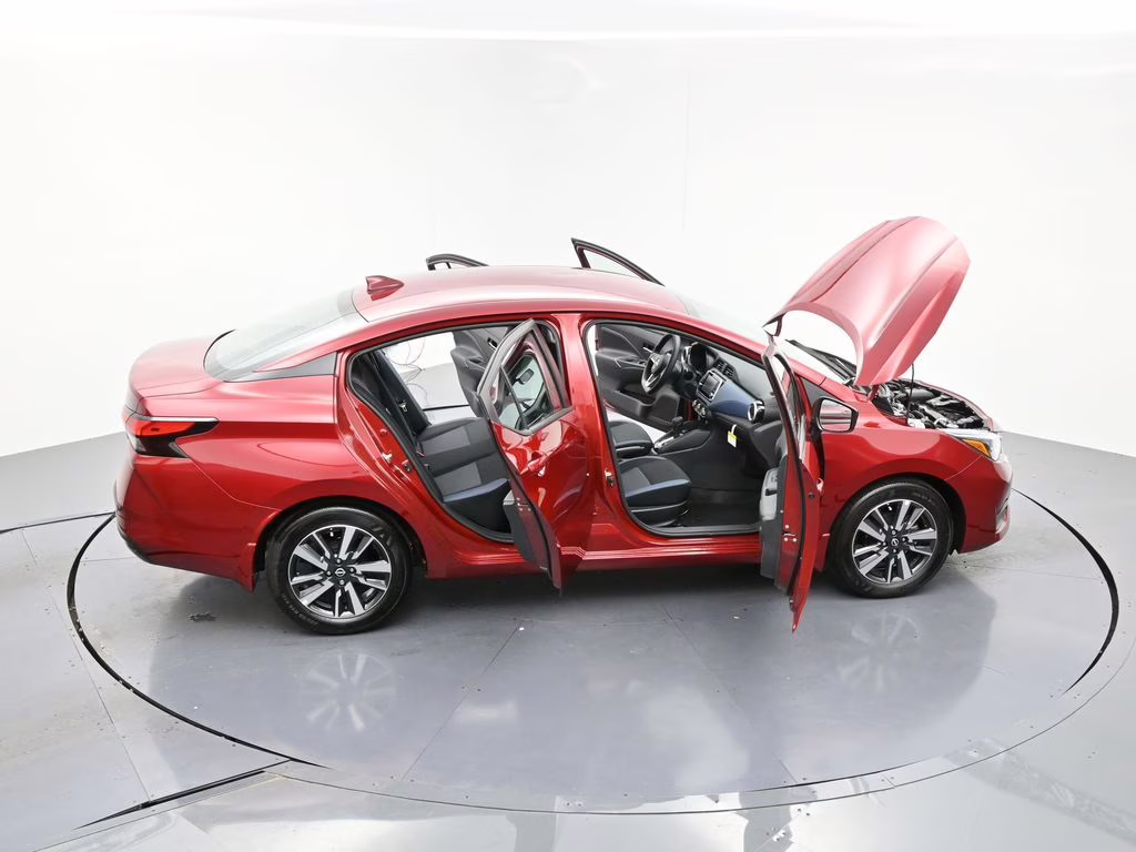 2025 Scarlet Ember Tintcoat Nissan Versa 1.6 SV FWD Sedan