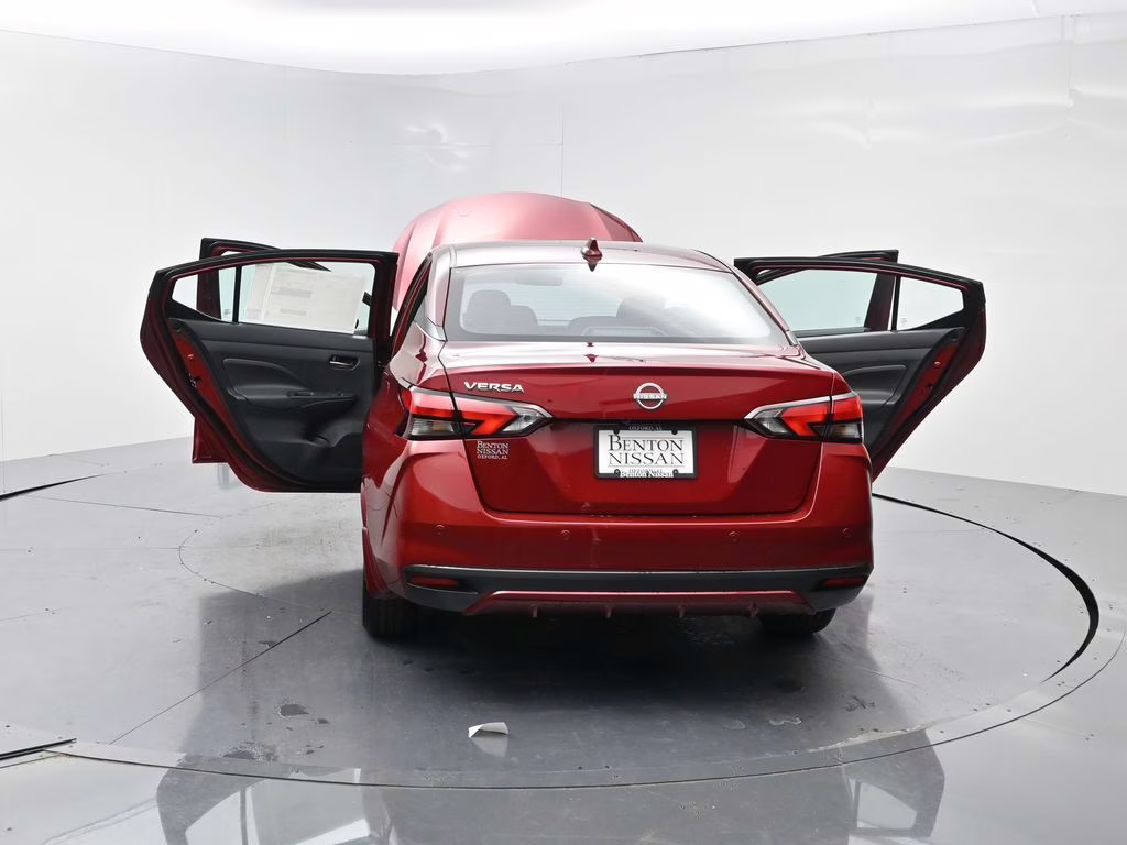 2025 Scarlet Ember Tintcoat Nissan Versa 1.6 SV FWD Sedan