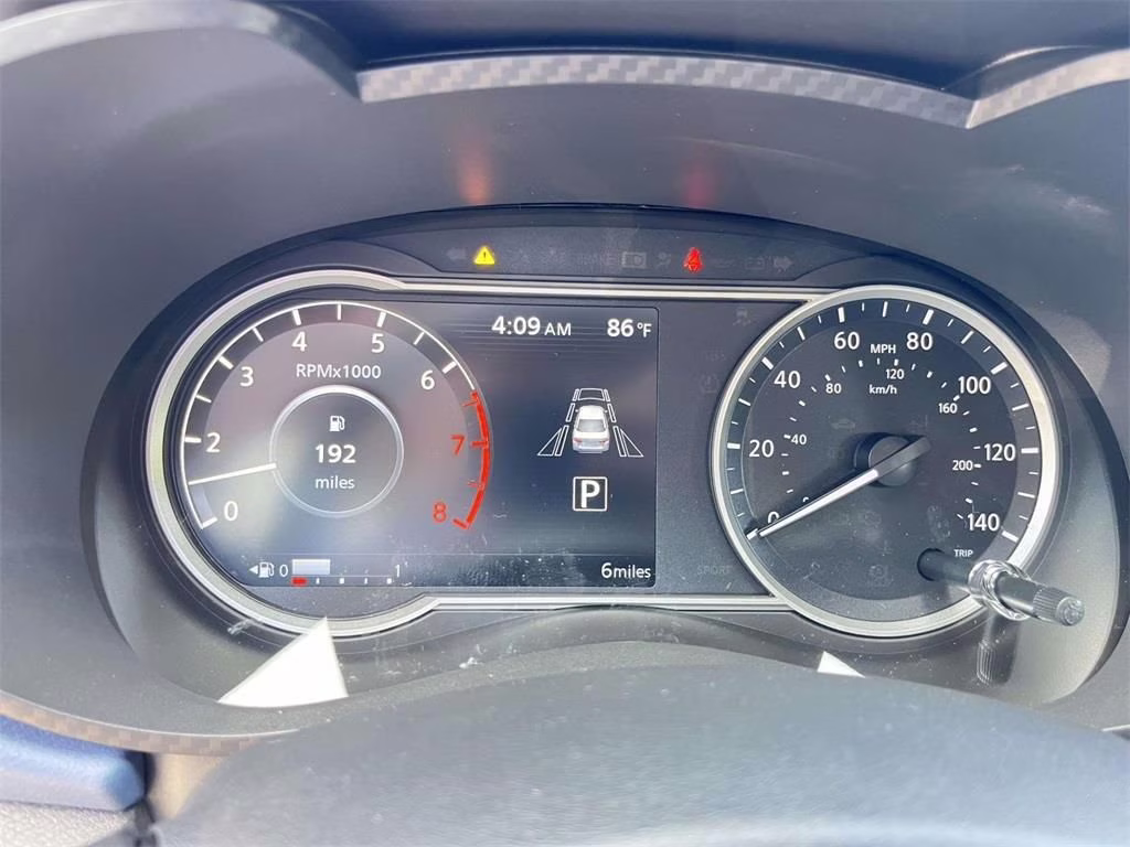 2025 Aspen White Tricoat Nissan Versa 1.6 SV FWD Sedan