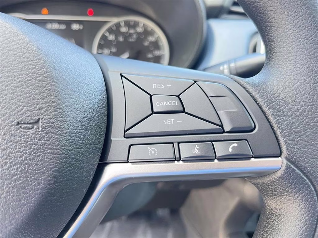 2025 Aspen White Tricoat Nissan Versa 1.6 SV FWD Sedan