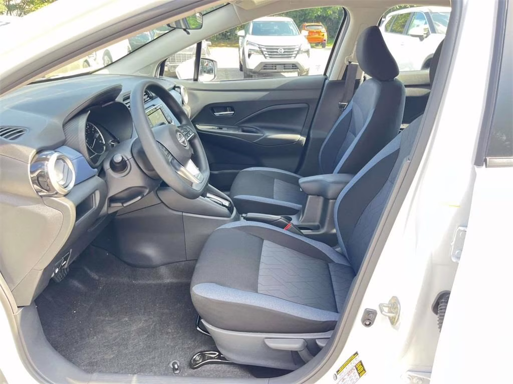 2025 Aspen White Tricoat Nissan Versa 1.6 SV FWD Sedan
