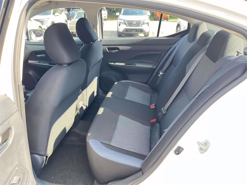 2025 Aspen White Tricoat Nissan Versa 1.6 SV FWD Sedan