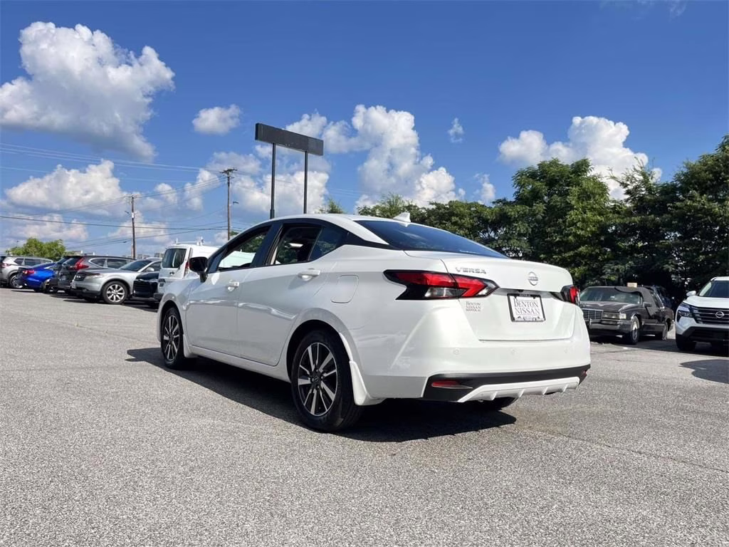 2025 Aspen White Tricoat Nissan Versa 1.6 SV FWD Sedan