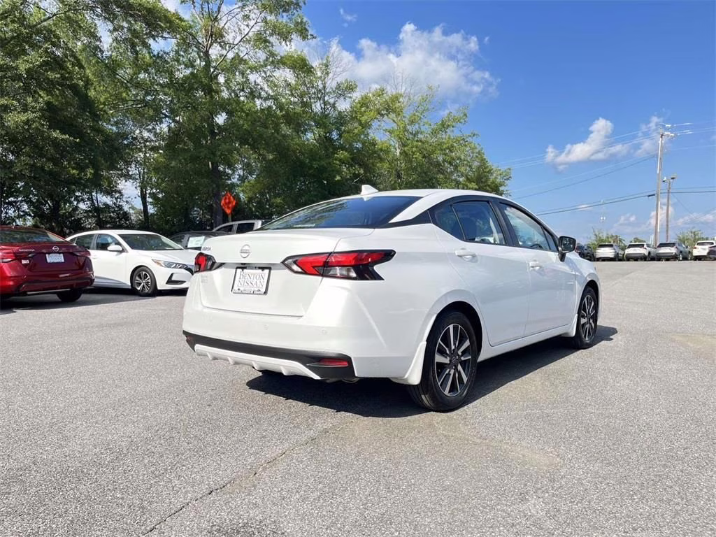 2025 Aspen White Tricoat Nissan Versa 1.6 SV FWD Sedan