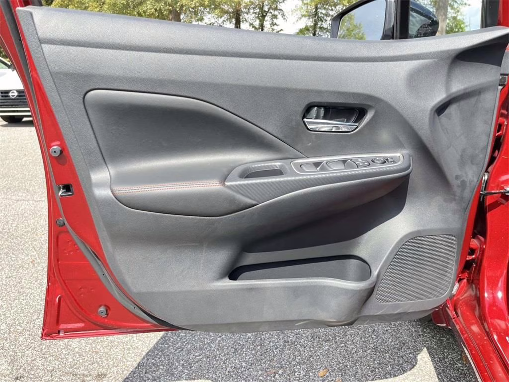 2025 Scarlet Ember Tintcoat Nissan Versa 1.6 SR FWD Sedan