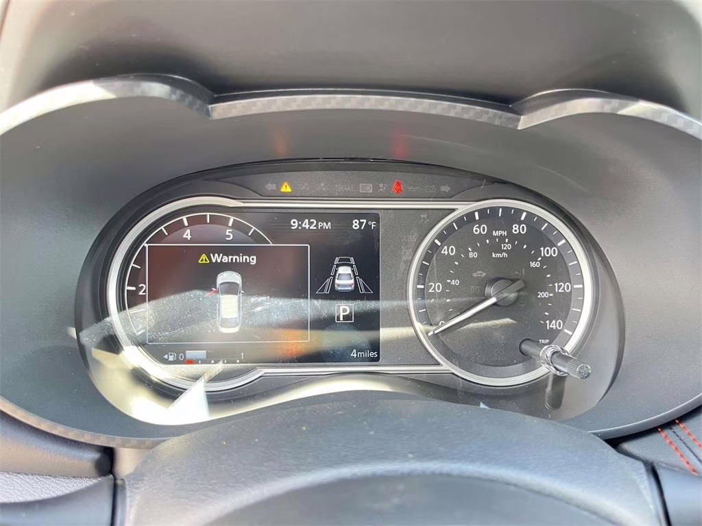 2025 Scarlet Ember Tintcoat Nissan Versa 1.6 SR FWD Sedan