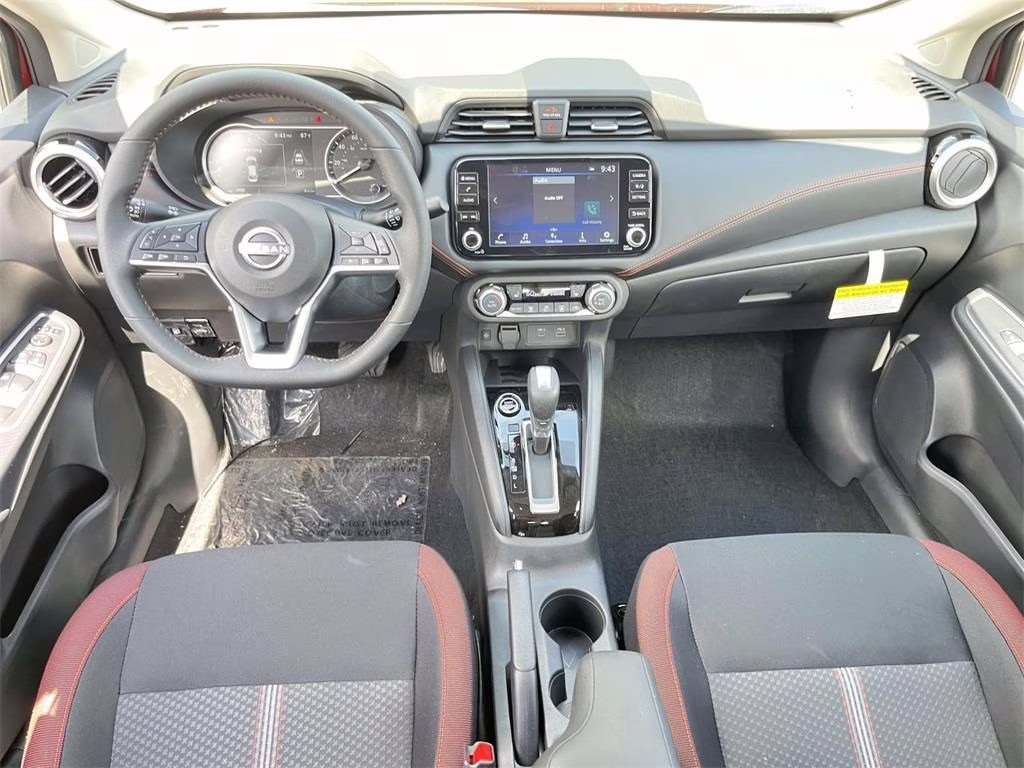 2025 Scarlet Ember Tintcoat Nissan Versa 1.6 SR FWD Sedan