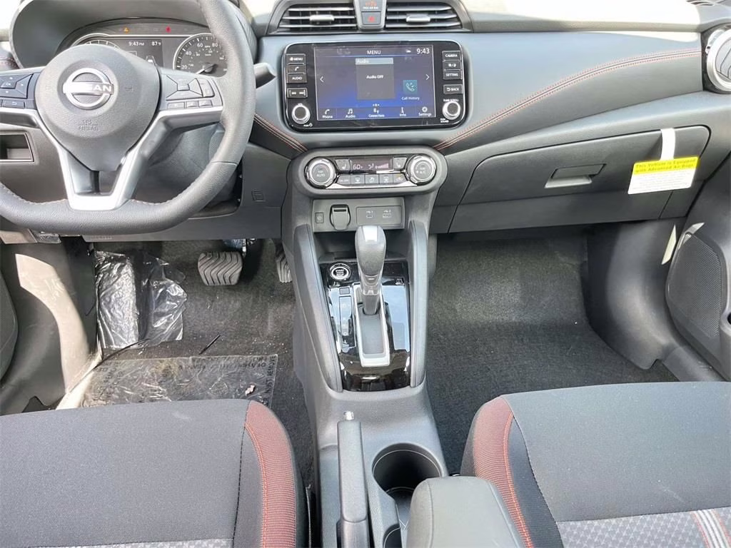 2025 Scarlet Ember Tintcoat Nissan Versa 1.6 SR FWD Sedan