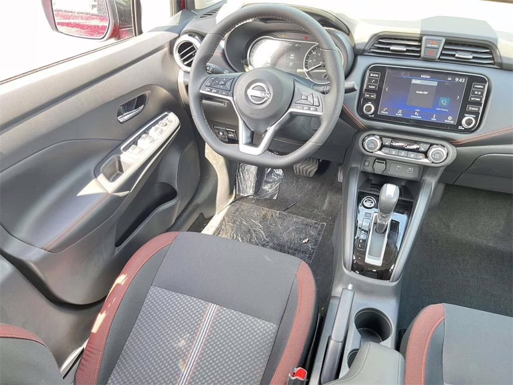 2025 Scarlet Ember Tintcoat Nissan Versa 1.6 SR FWD Sedan