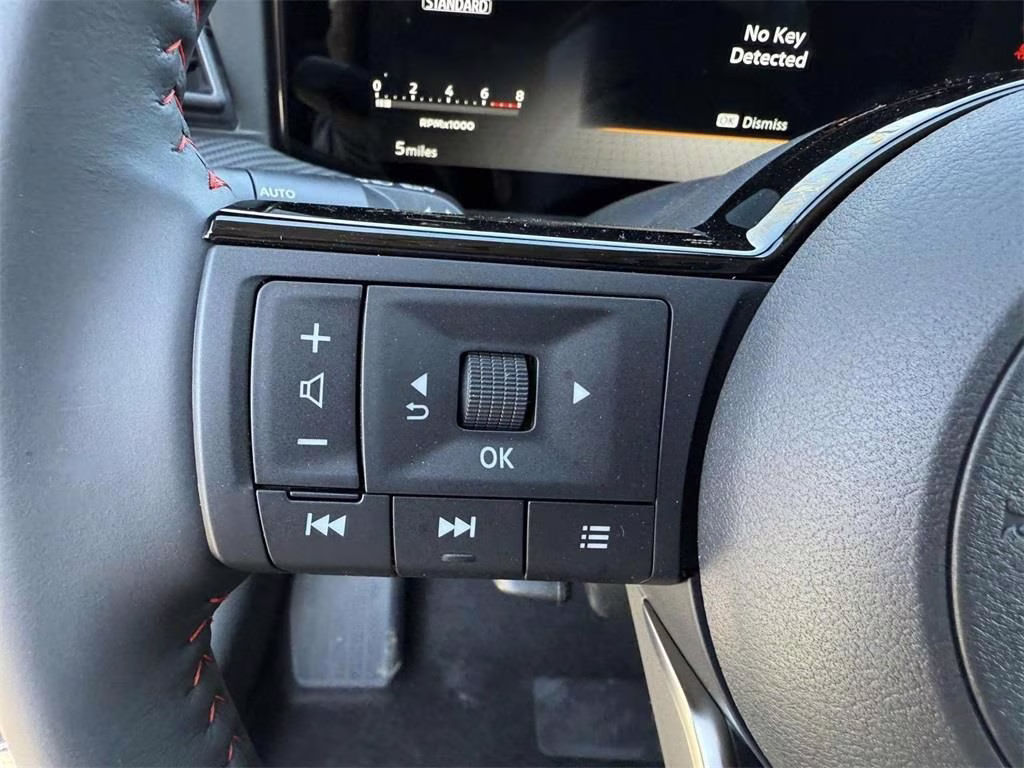 2025 Deep Blue Pearl/Gun Metallic Nissan Kicks SR FWD SUV