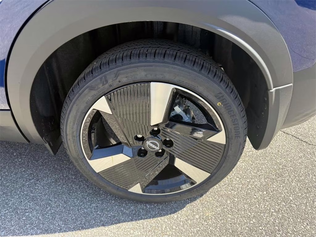 2025 Deep Blue Pearl/Gun Metallic Nissan Kicks SR FWD SUV