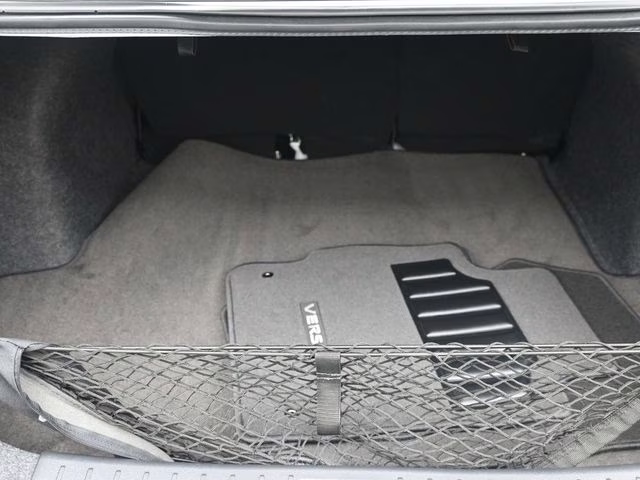 2025 Aspen White Tricoat Nissan Versa 1.6 SV FWD Sedan