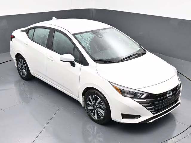 2025 Aspen White Tricoat Nissan Versa 1.6 SV FWD Sedan