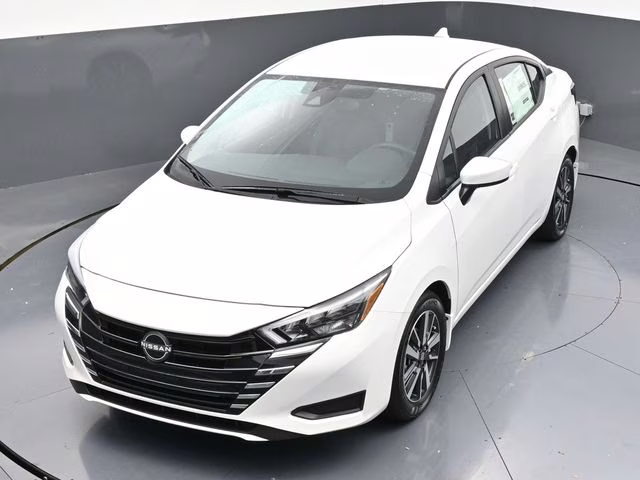 2025 Aspen White Tricoat Nissan Versa 1.6 SV FWD Sedan