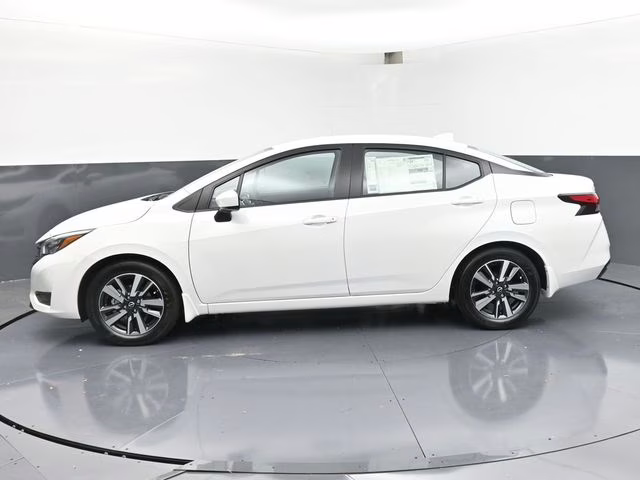 2025 Aspen White Tricoat Nissan Versa 1.6 SV FWD Sedan