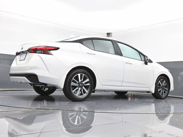 2025 Aspen White Tricoat Nissan Versa 1.6 SV FWD Sedan